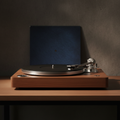 Victrola vintage turntable on a minimal desk with vinyl record
